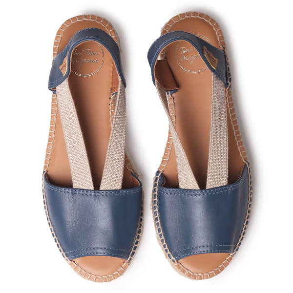 Toni Pons Etna women's navy leather elasticated sandals with beige fabric straps and stitched sole detail.