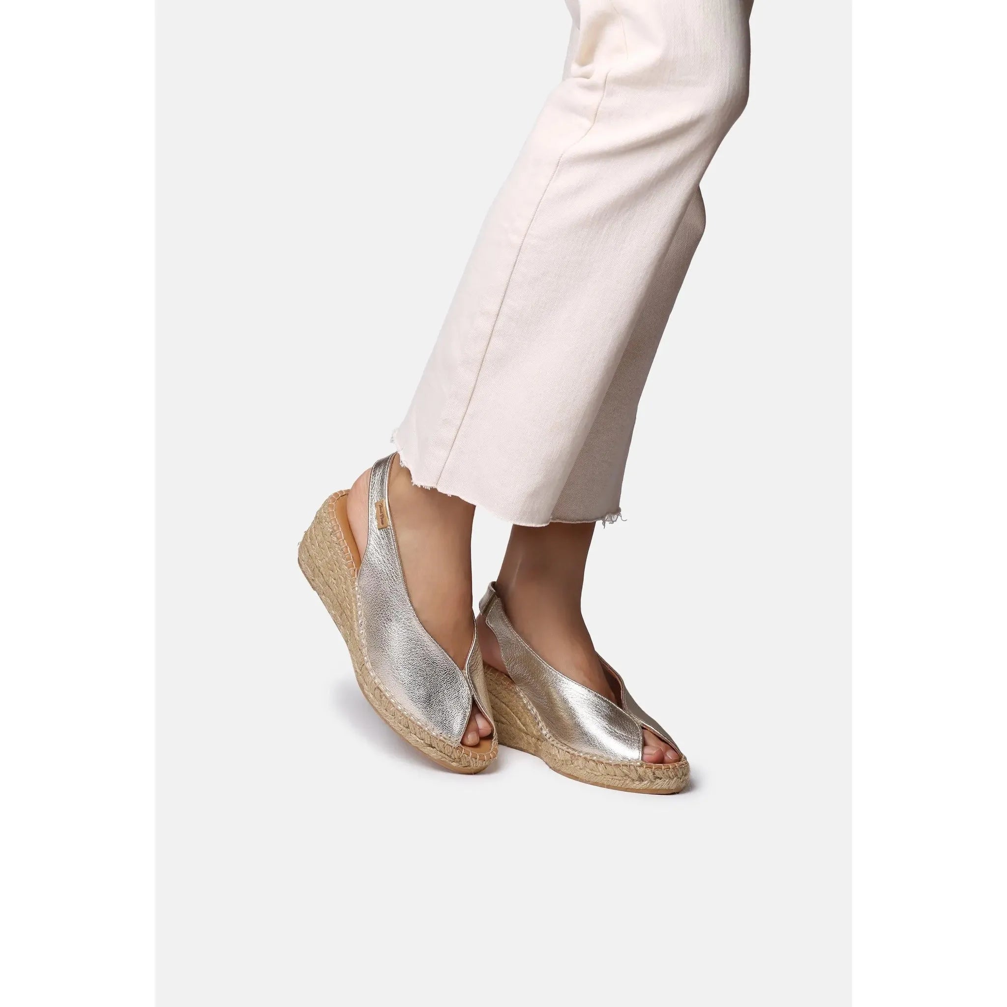 Toni Pons Laila-P ladies' platinum leather sandals with open toes, ankle strap, and woven wedge heel.