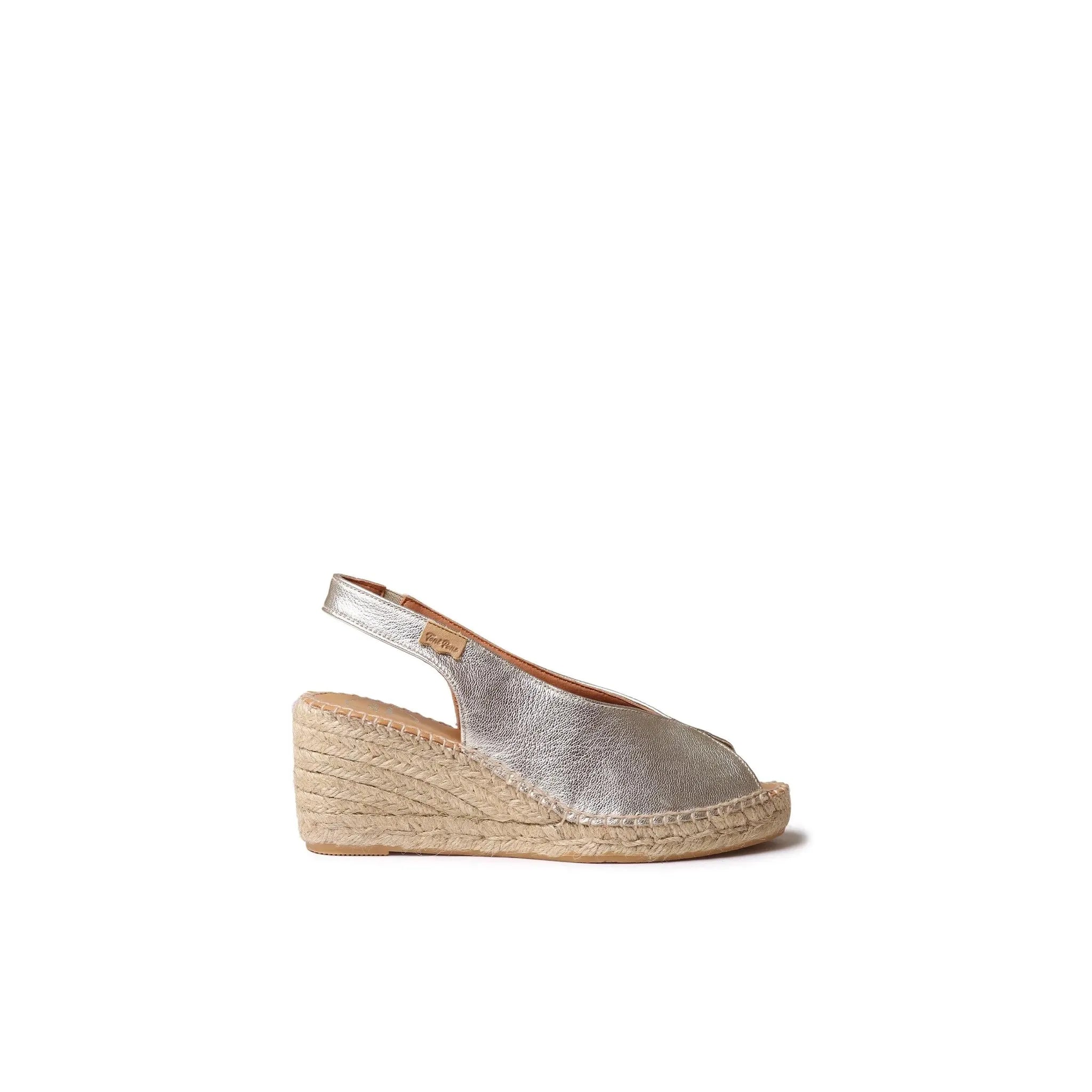 Alt text: Toni Pons Laila-P Ladies Spanish Platinum Leather Sandals with wedge heel and metallic finish.