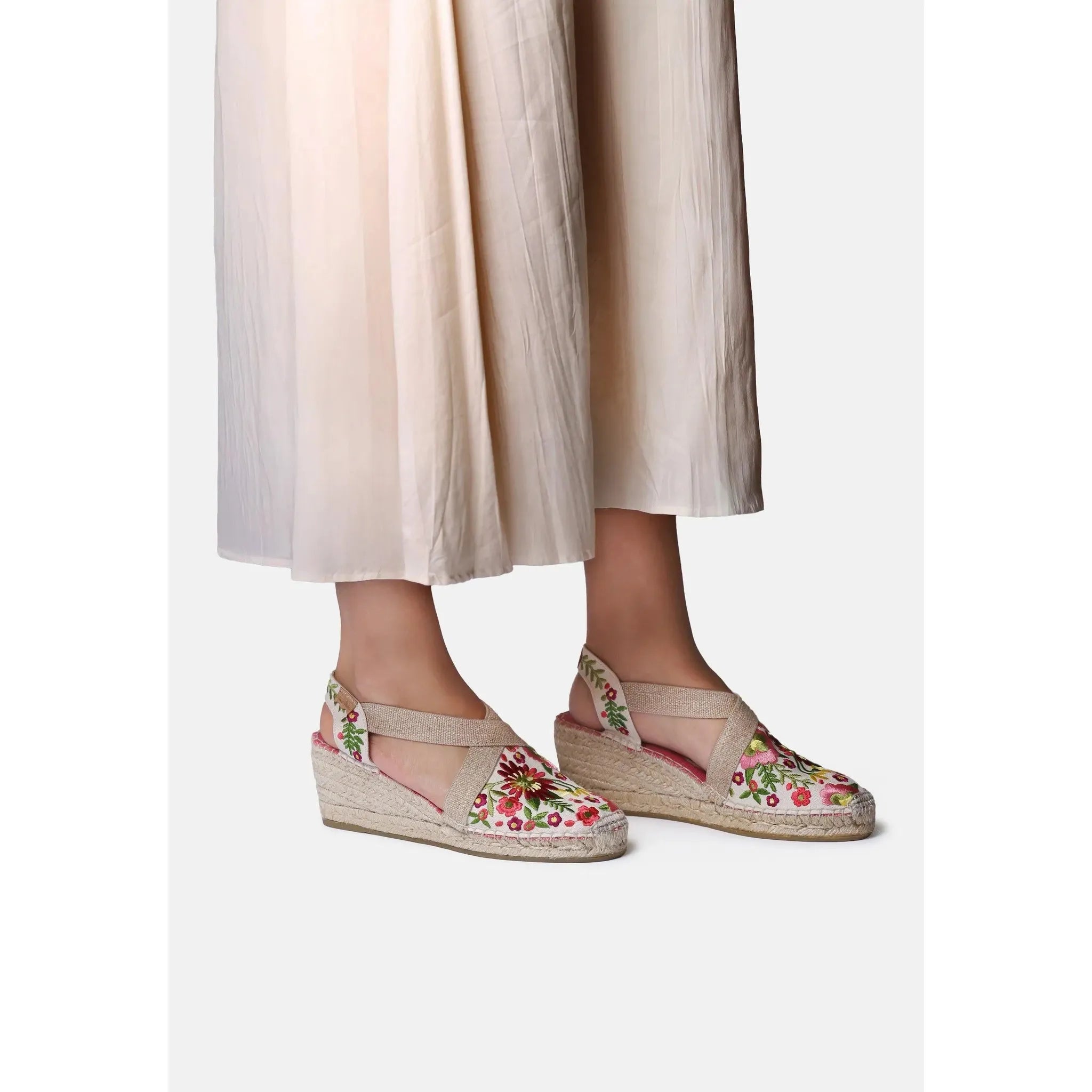 Toni Pons Monjoi women's espadrille sandals with floral embroidery and ankle straps, featuring woven jute soles and patterned fabric.