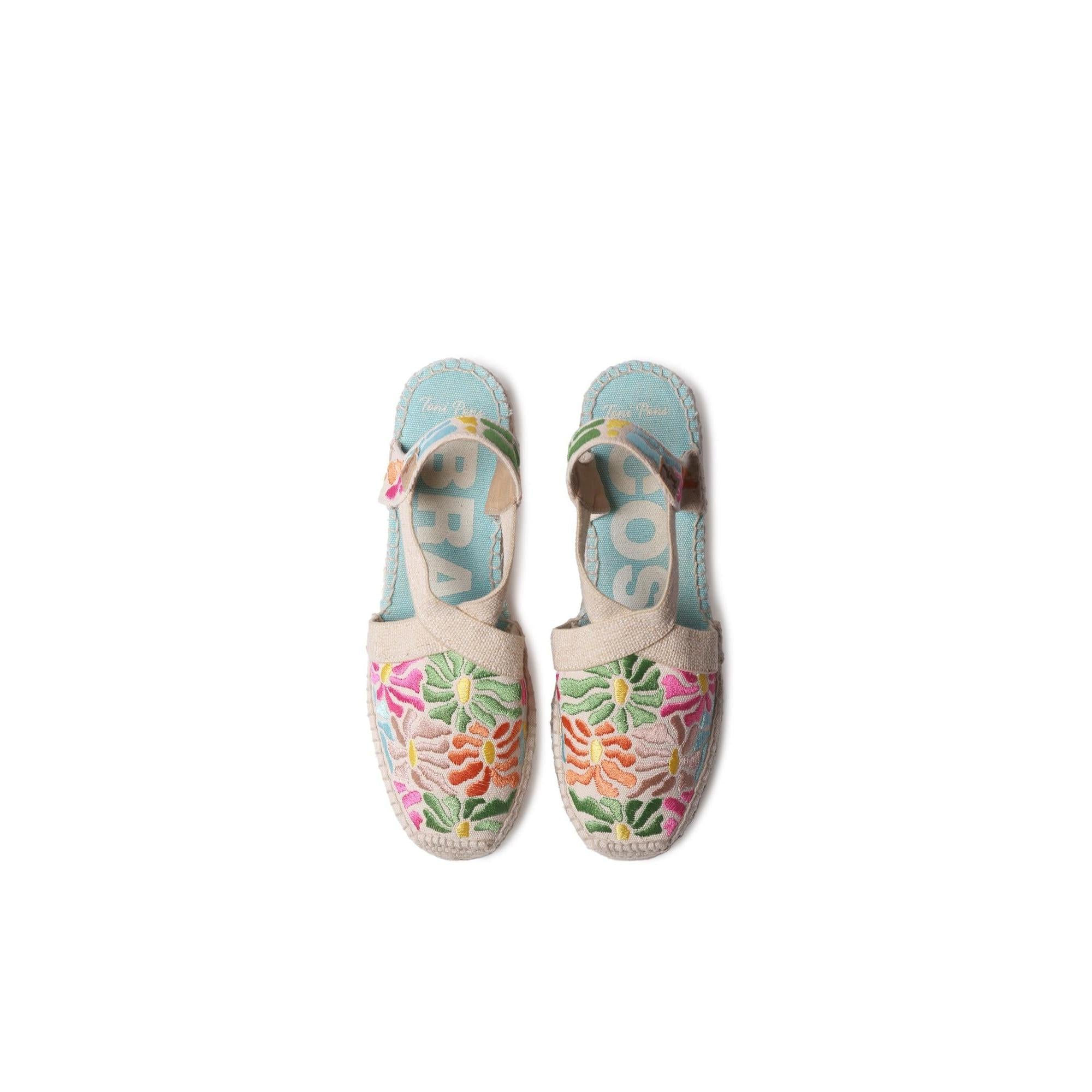 Toni Pons Montjoi ladies espadrille sandals with Spanish mosaic embroidery, elastic straps, and floral design in pastel colors.