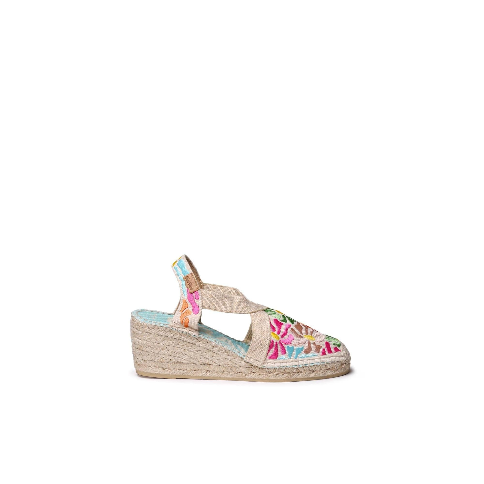 Toni Pons Montjoi women's Spanish mosaic textile espadrille wedge sandal with elastic strap and colorful embroidery.