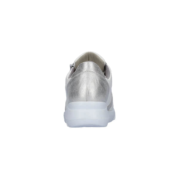 Close-up of women's white and silver leather trainers with zip and lace, arch support, casual sneaker style.