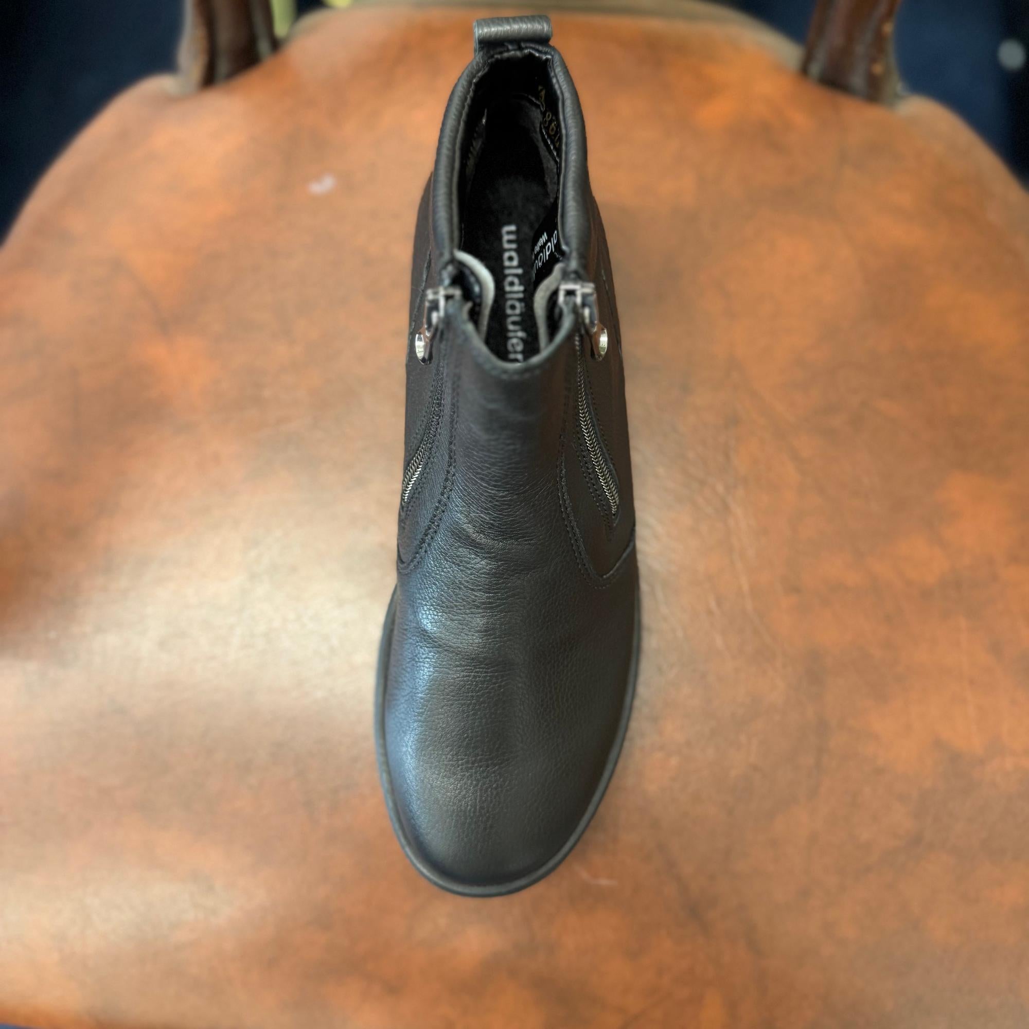 Waldlaufer women's black leather ankle boots with twin zips, arch support, wide fit, and stylish design.