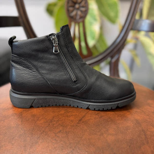 Waldlaufer women’s black leather ankle boots with side zip, arch support, wide fit, and rugged sole.