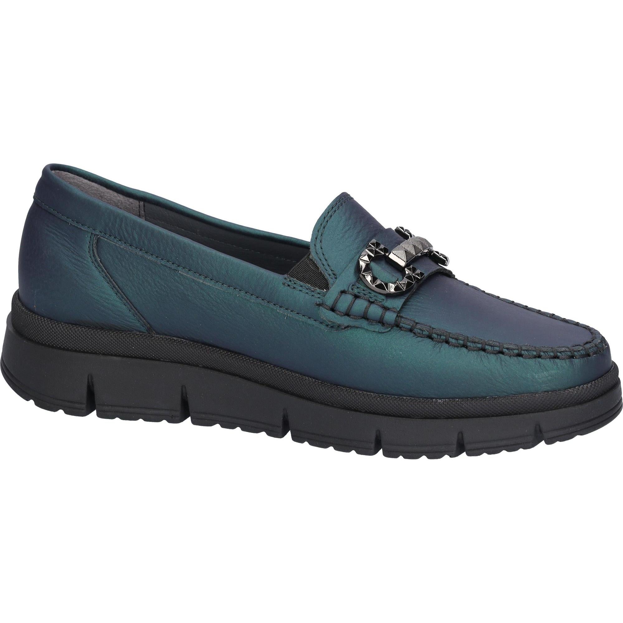 Waldlaufer women's wide-fit blue leather slip-on shoes with arch support, decorative metal buckle, and chunky black sole.