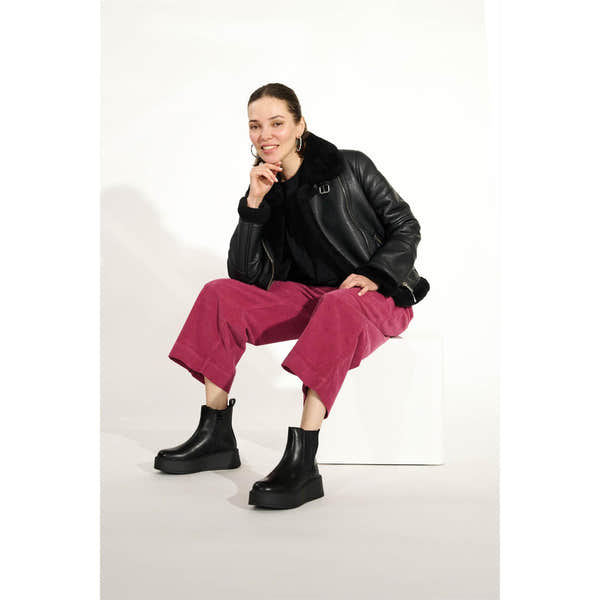 Westland Gemma 01 women's black vegan platform chelsea ankle boots worn on foot, Westland lifestyle view 2.