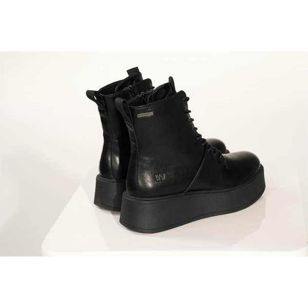 Westland Gemma 02 women's black vegan zip-and-lace platform ankle boots worn on foot, Westland lifestyle view 4.