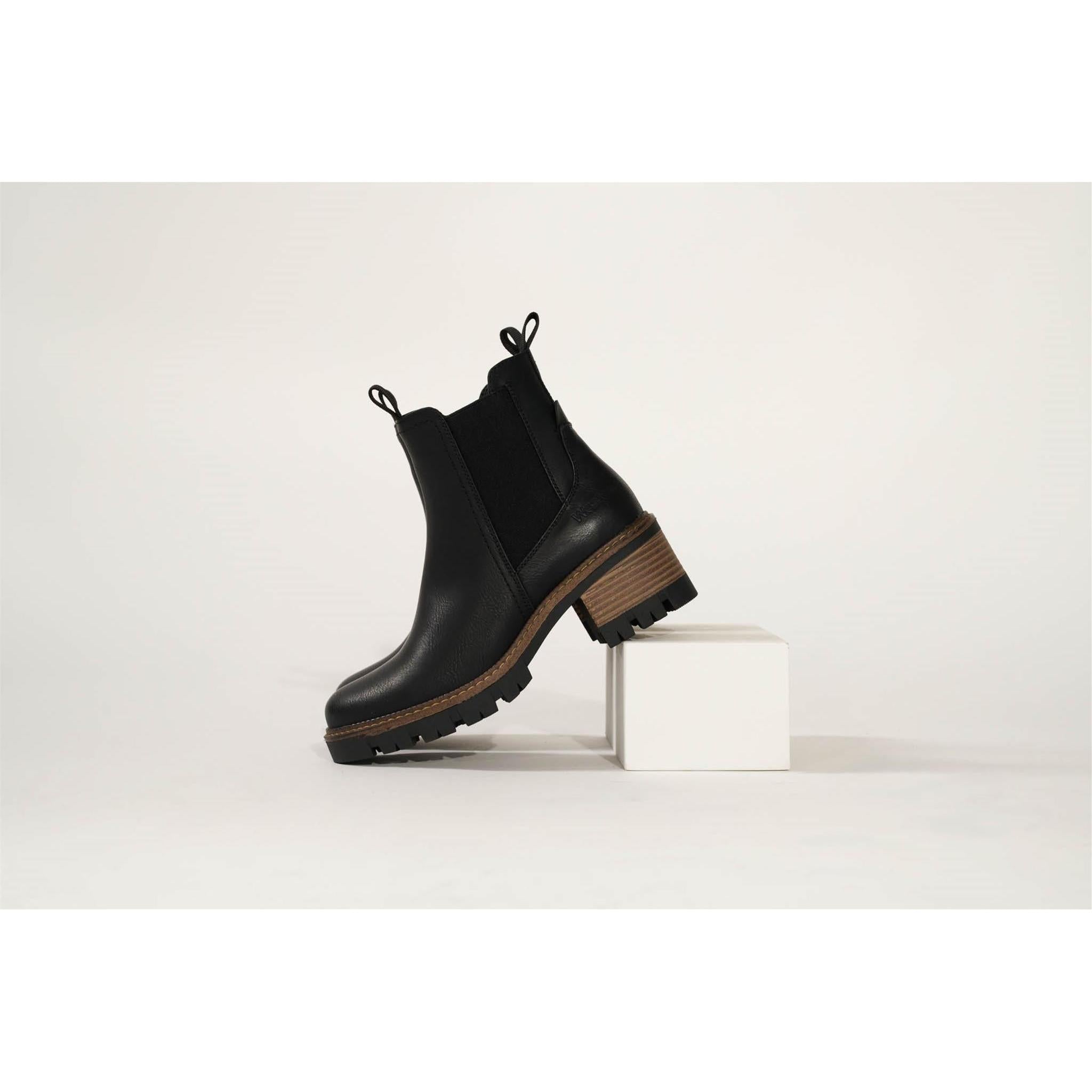 Westland Geri 03 women's black vegan heeled chelsea ankle boots worn on foot, Westland lifestyle view 14.