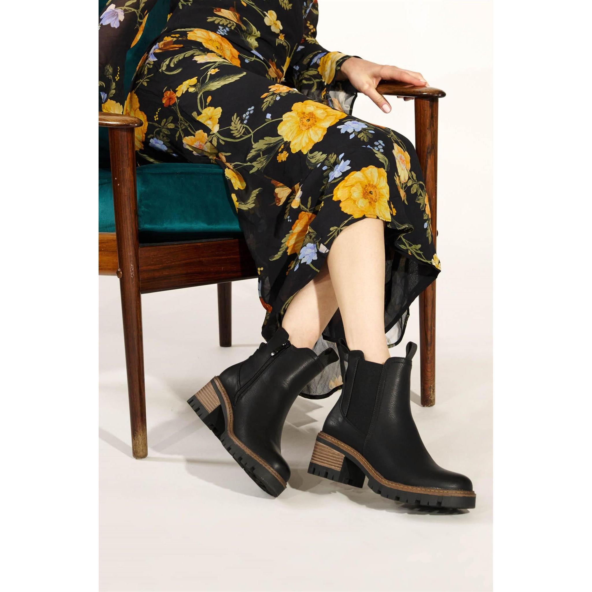 Westland Geri 03 women's black vegan heeled chelsea ankle boots worn on foot, Westland lifestyle view 4.