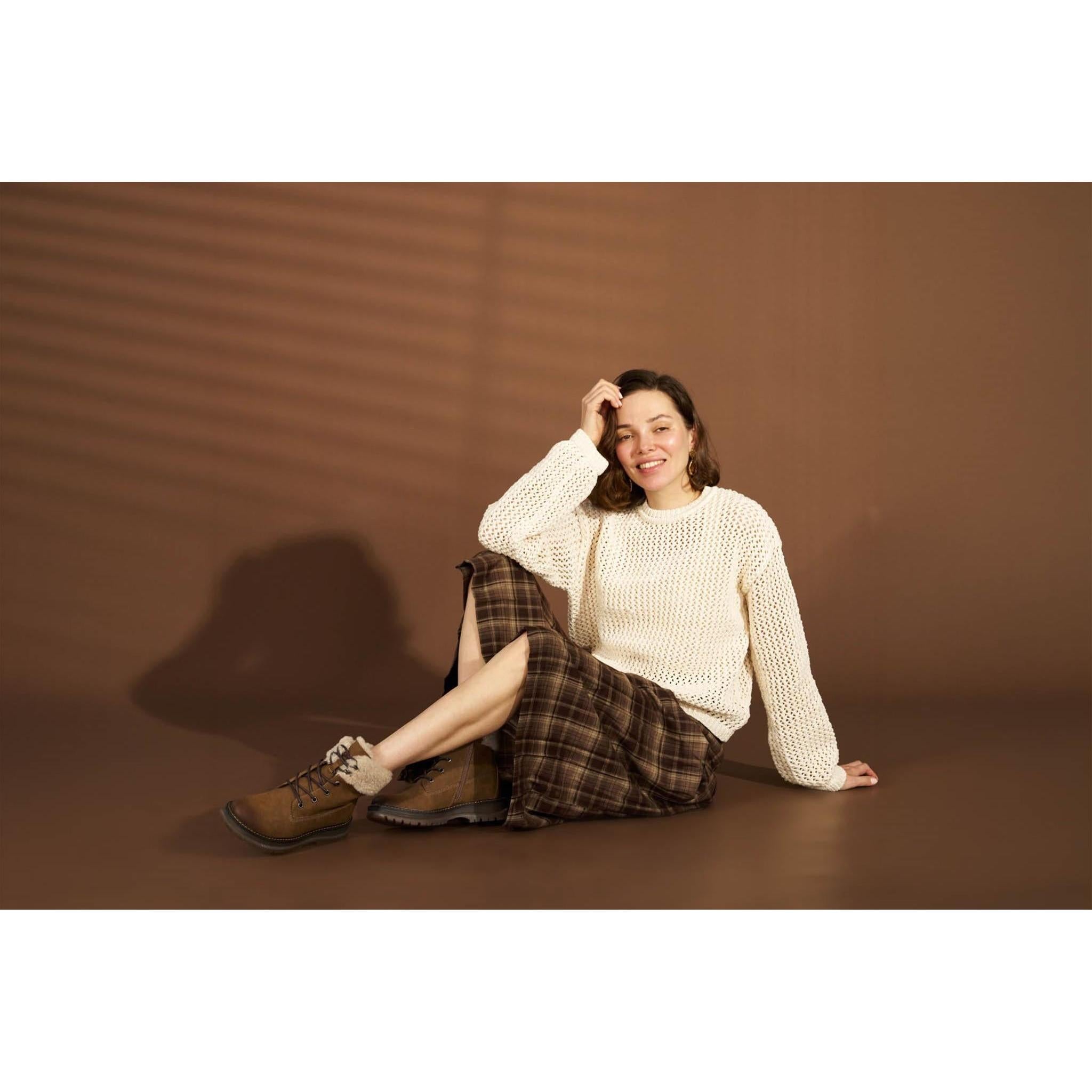 Westland Peyton 16 women's brown vegan waterproof zip-and-lace faux fur ankle boots worn on foot, Westland lifestyle view 2.