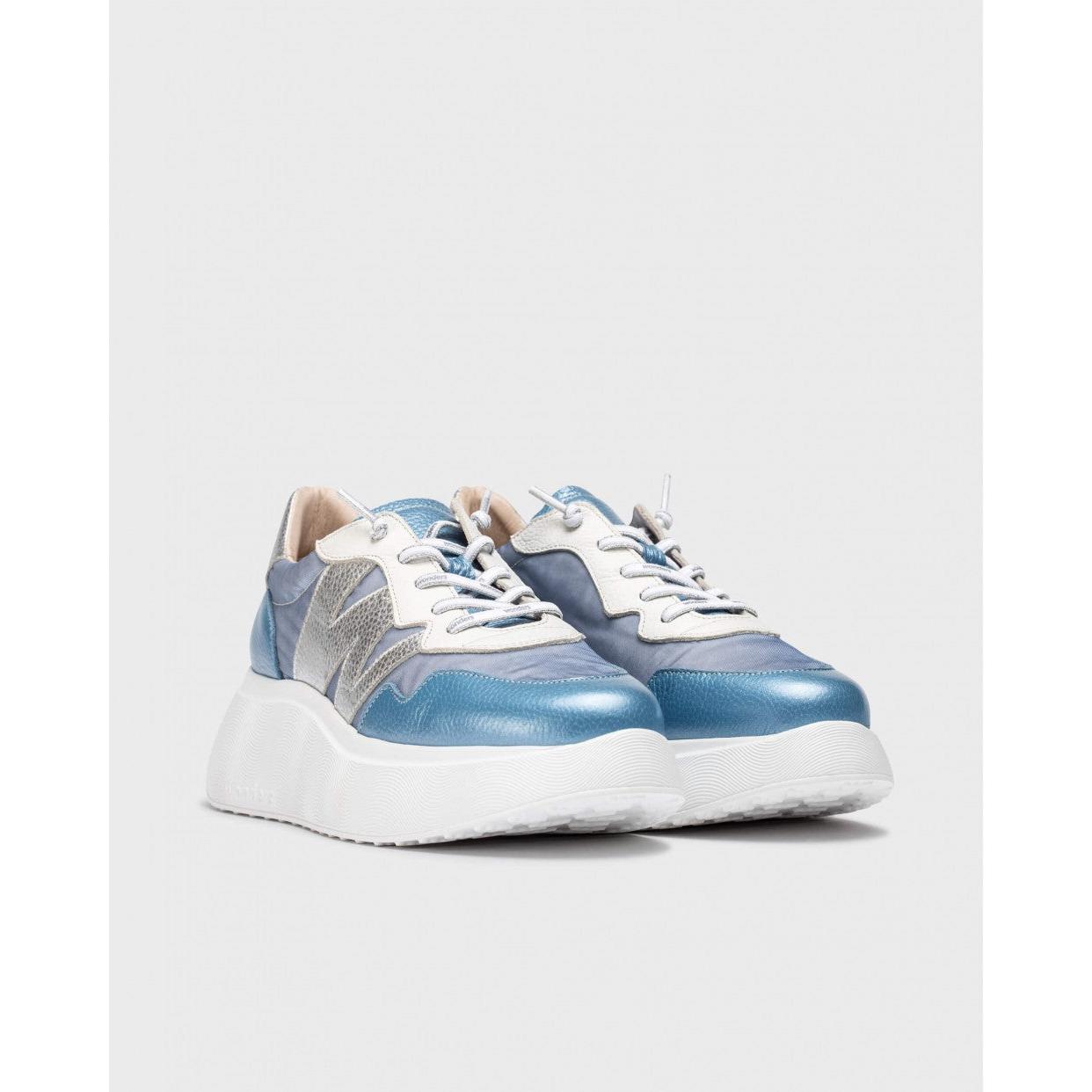 Wonders A-3622 Ladies blue and silver leather and textile lace-up trainers with chunky white soles.