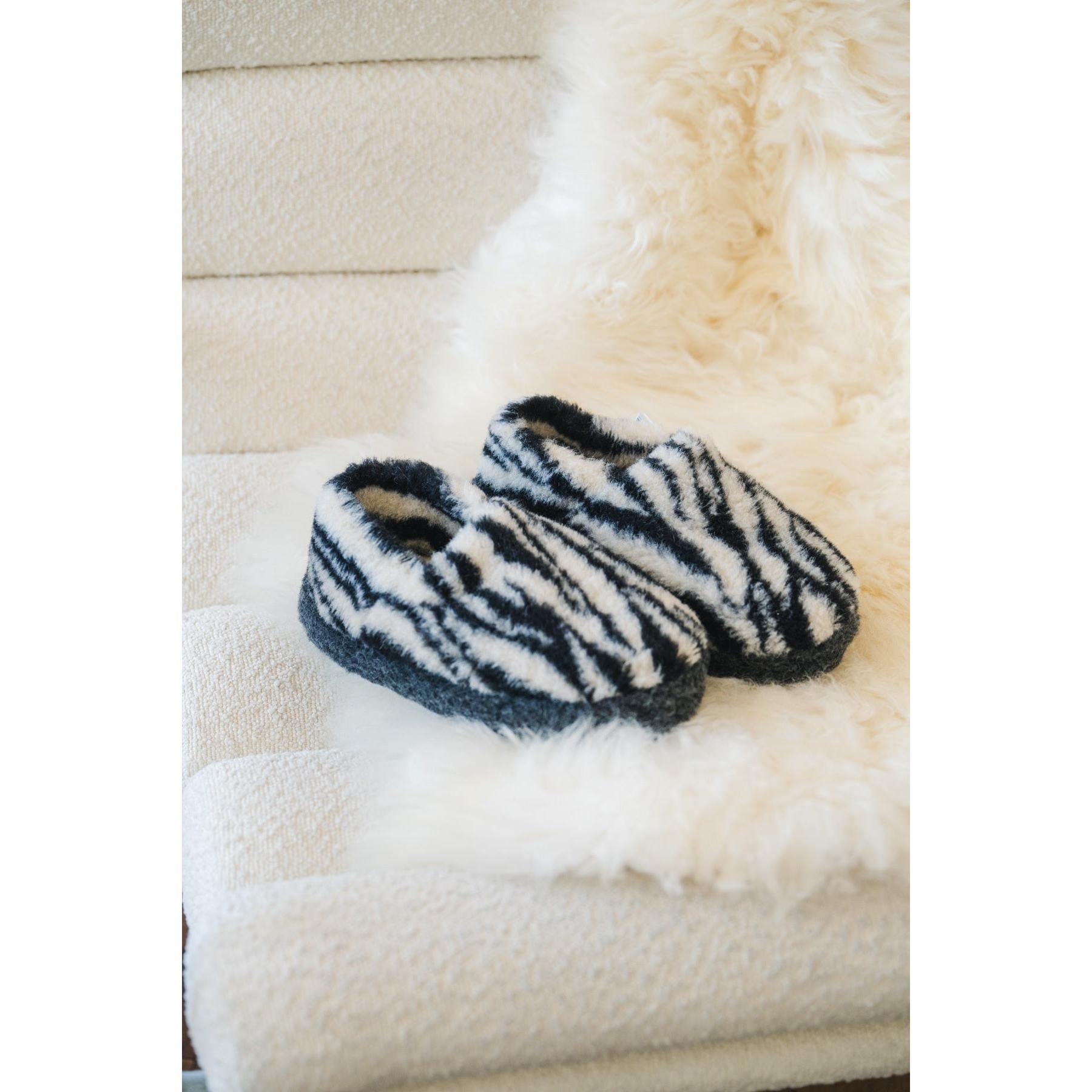 Yoko 2428 Zebra Print unisex wool slippers in black and white, lifestyle view.