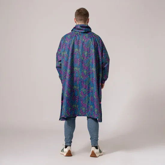 Unisex neon jazz festival poncho with abstract colorful pattern, oversized fit, and rain-resistant fabric, perfect for outdoor events.