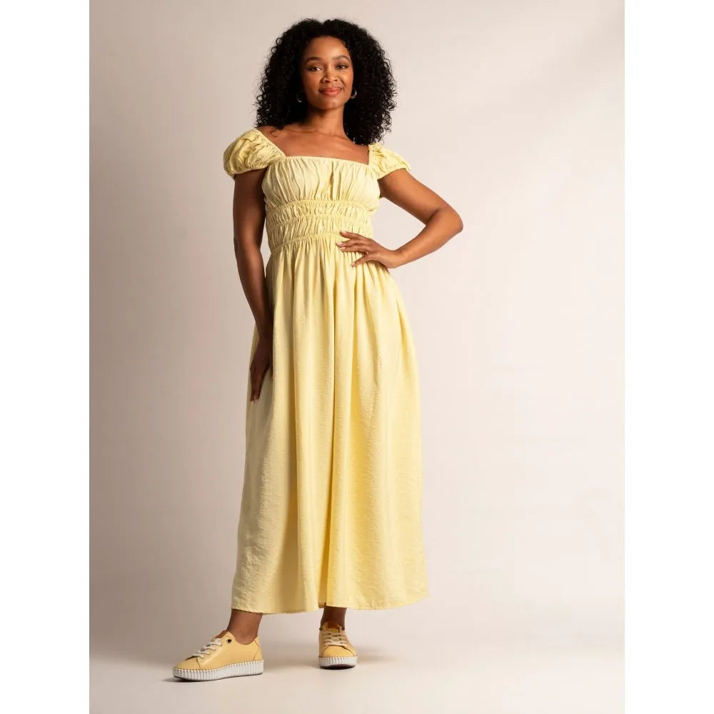 Lunar FLE057 Faith Ladies Lemon Leather Lace-Up Shoes paired with a yellow maxi dress, stylish and comfortable footwear with lace-up design.