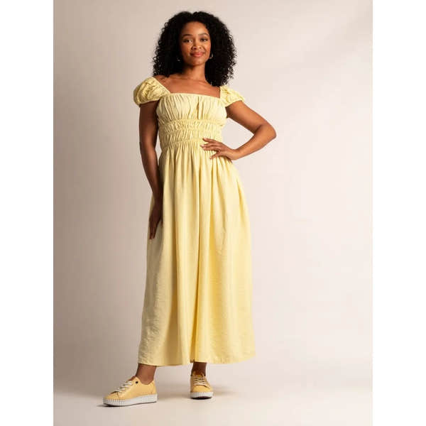 Lunar FLE057 Faith Ladies Lemon Leather Lace-Up Shoes paired with a yellow maxi dress, stylish and comfortable footwear with lace-up design.