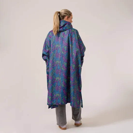 Unisex festival poncho with neon jazz pattern, colorful abstract design, hooded, oversized fit, perfect for rain and rainwear.