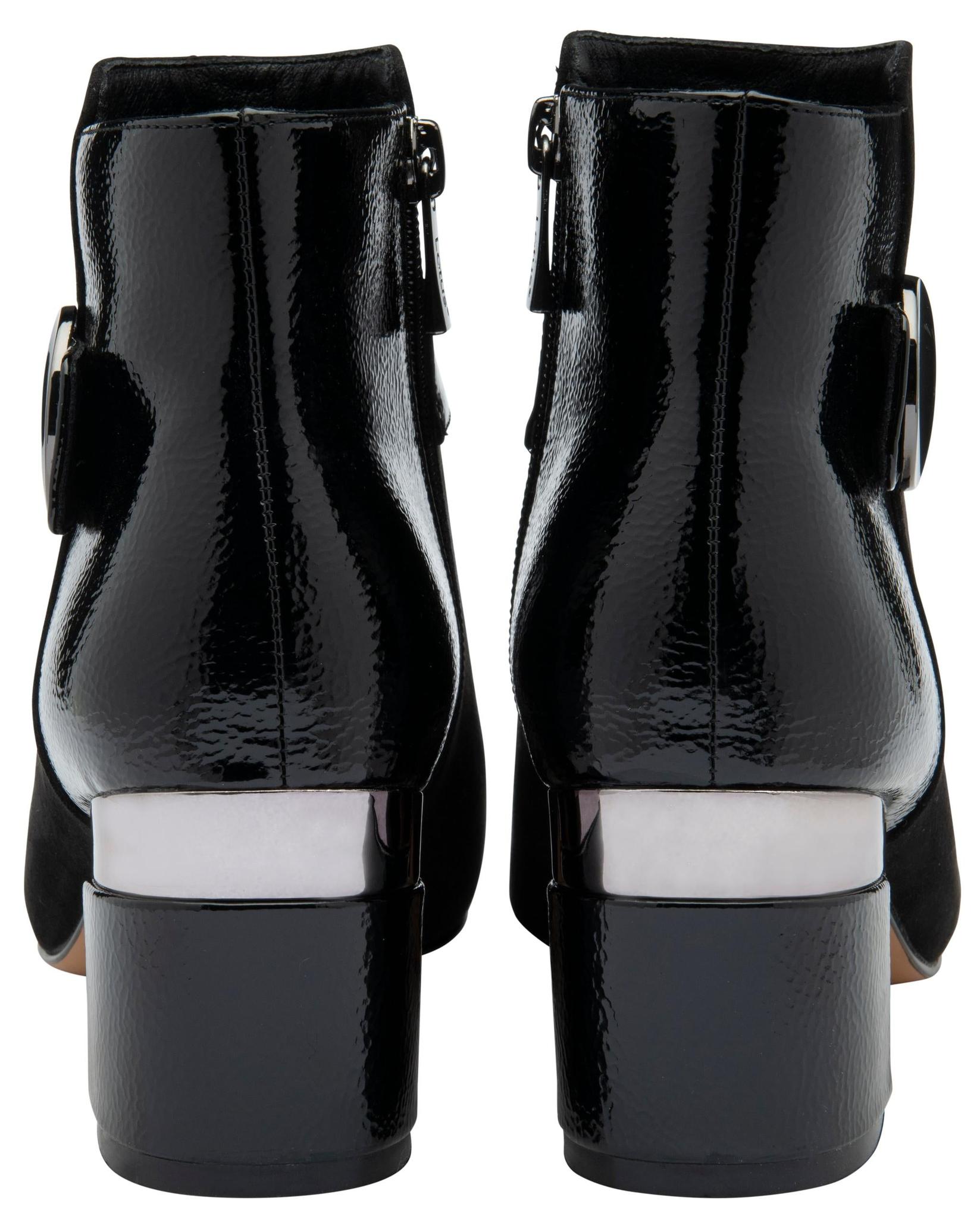 Lotus ULB419 Kirsty women's black combi buckle side zip heeled ankle boots, heel view.