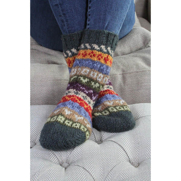 Pachamama Elveden Sofa Socks, with colourful Fair Isle bands; product view.