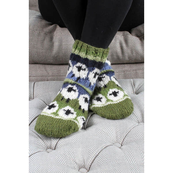 Pachamama Flock Of Sheep Sofa Socks, with rows of sheep; product view.