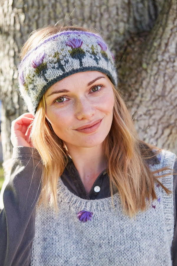 Pachamama Thistle Headband, with embroidered purple thistles; product view.