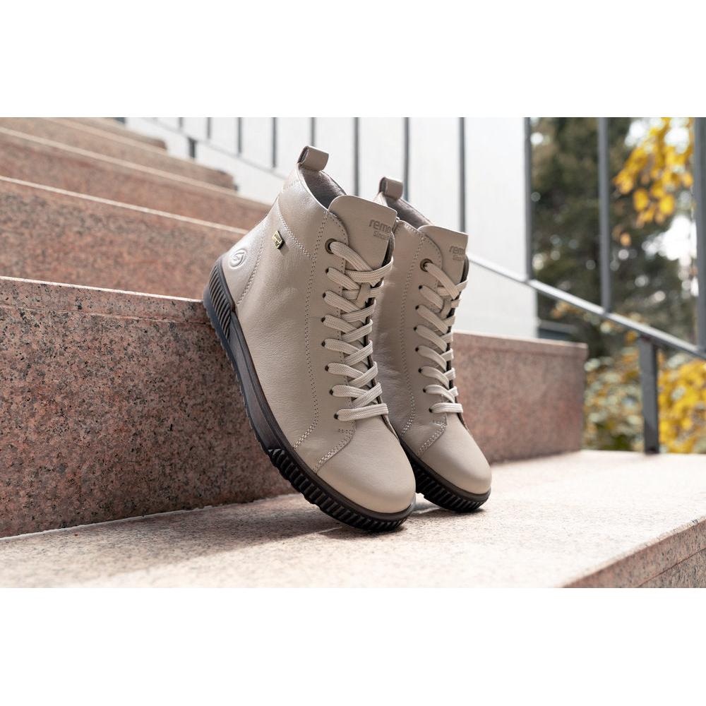 Remonte D0782-62 women's wide off white leather water resistant zip & lace ankle boots, lifestyle view 2 of 2.