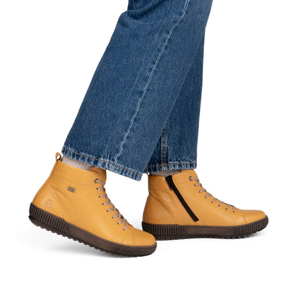 Remonte D0782-68 women's wide yellow leather water resistant lace up ankle boots, on-foot lifestyle view.