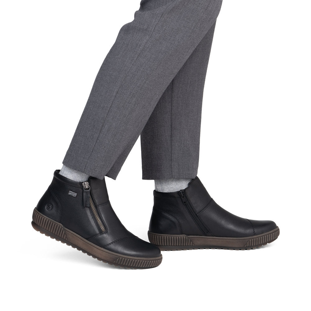 Remonte D0783-00 women's wide black leather water resistant side zip ankle boots, on-foot lifestyle view.
