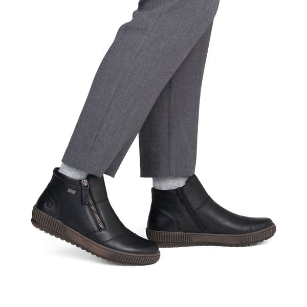 Remonte D0783-00 women's wide black leather water resistant side zip ankle boots, on-foot lifestyle view.