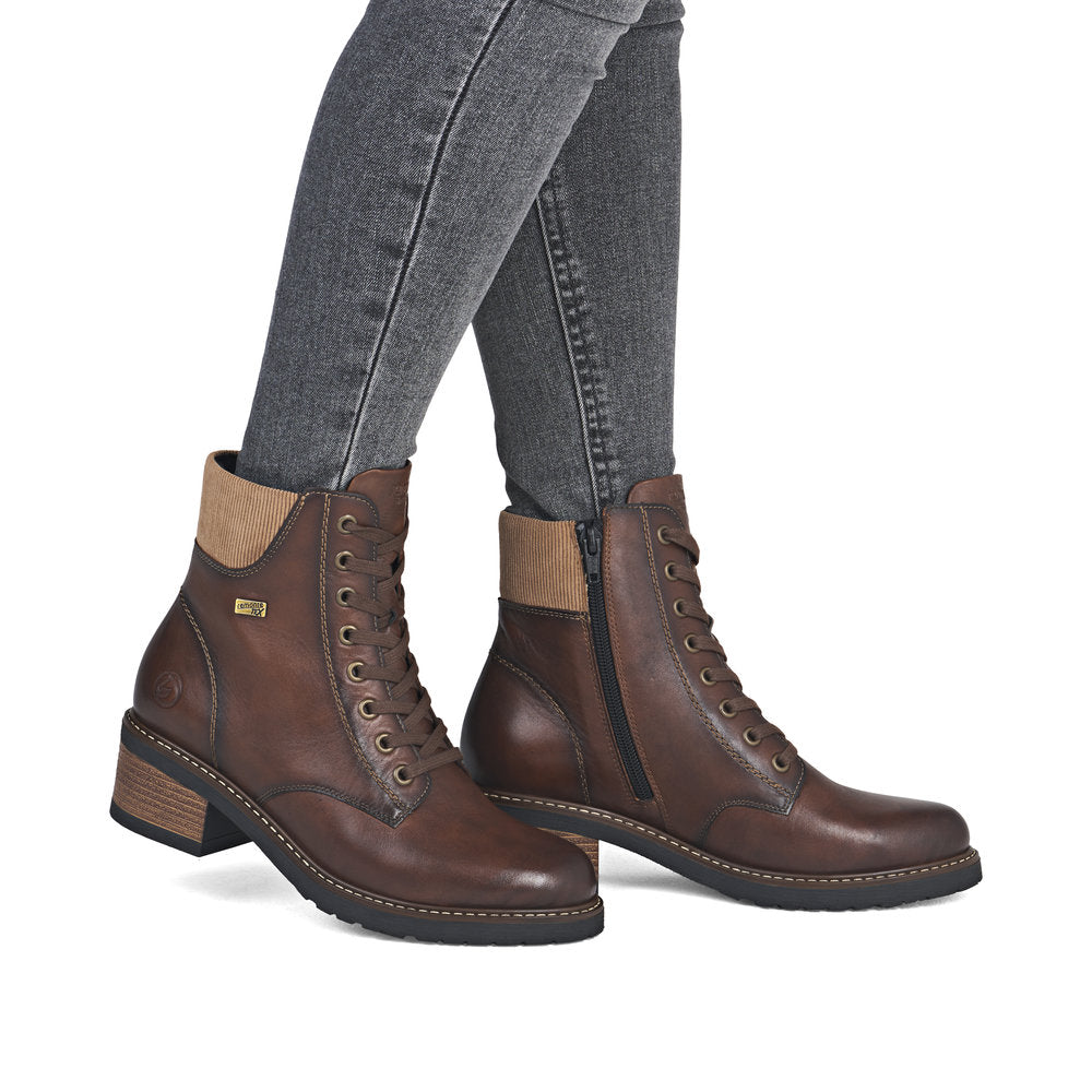 Remonte D1A70-24 women's brown leather water resistant lace up ankle boots, on-foot lifestyle view.