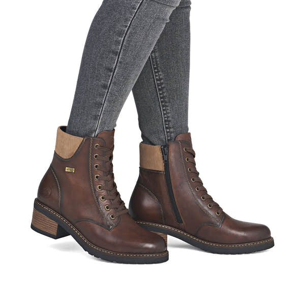 Remonte D1A70-24 women's brown leather water resistant lace up ankle boots, on-foot lifestyle view.