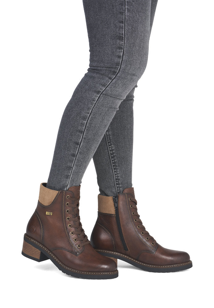Remonte D1A70-24 women's brown leather water resistant lace up ankle boots, on-foot lifestyle view.