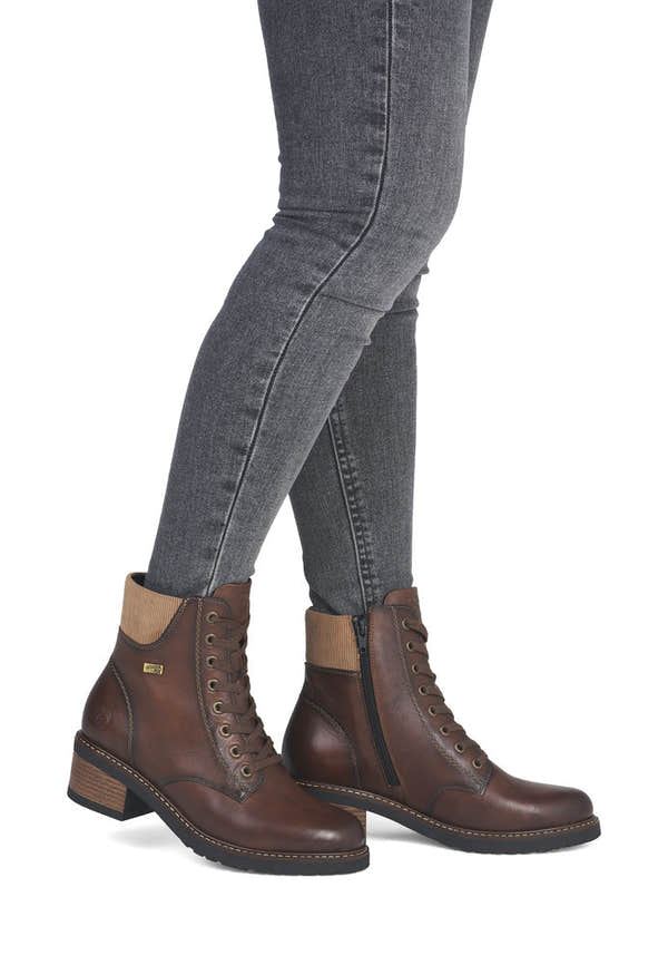 Remonte D1A70-24 women's brown leather water resistant lace up ankle boots, on-foot lifestyle view.