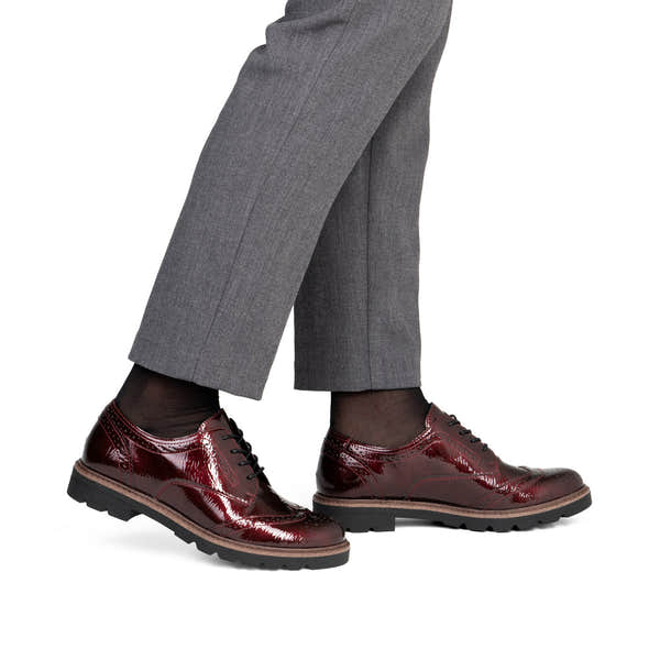 Remonte D2Q04-35 women's burgundy patent brogue lace up shoes, on-foot lifestyle view.