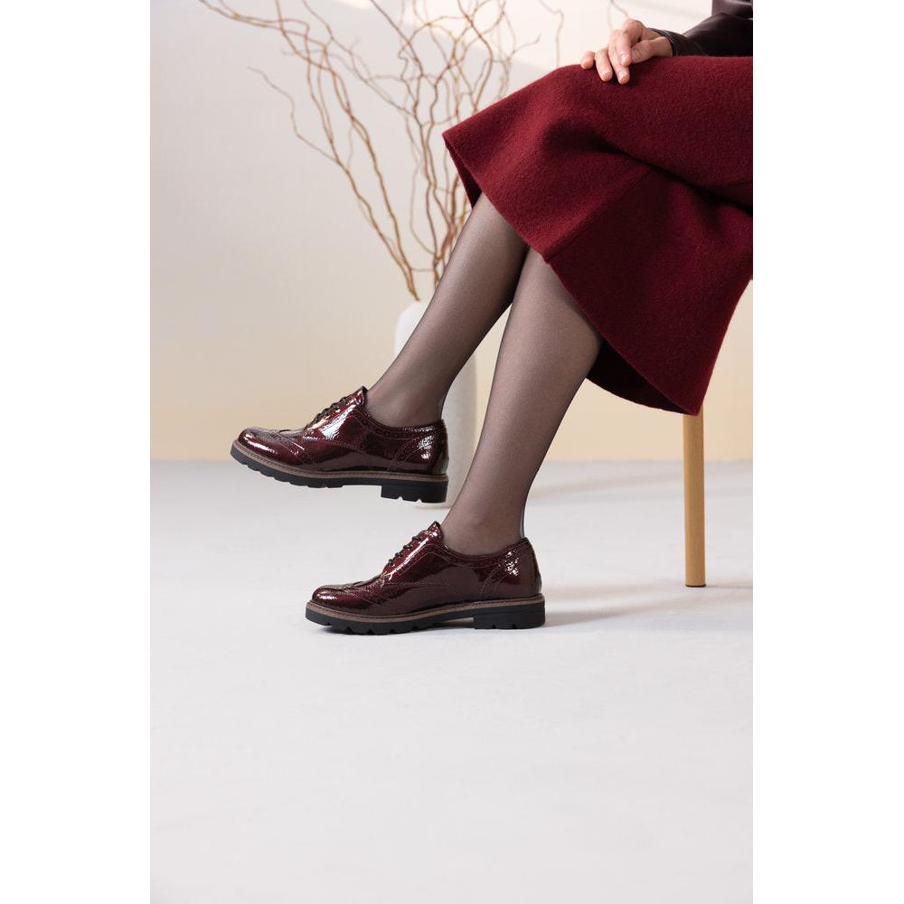 Remonte D2Q04-35 women's burgundy patent brogue lace up shoes, lifestyle view 2 of 4.