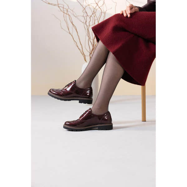 Remonte D2Q04-35 women's burgundy patent brogue lace up shoes, lifestyle view 2 of 4.