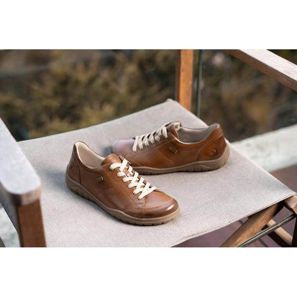 Remonte D3T00-24 women's wide brown leather water resistant zip & lace shoes, lifestyle view 1 of 3.