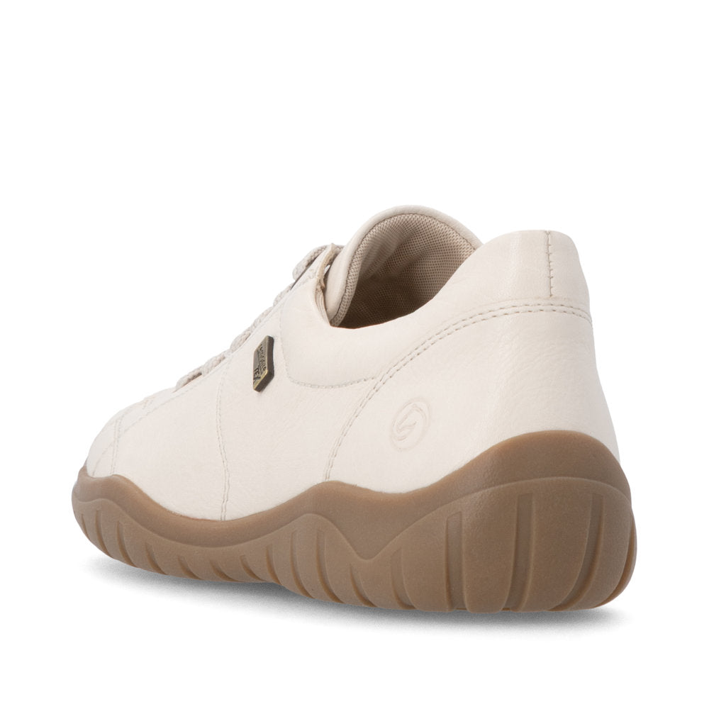 Remonte D3T00-60 women's wide beige leather water resistant zip & lace shoes, rear three-quarter view.