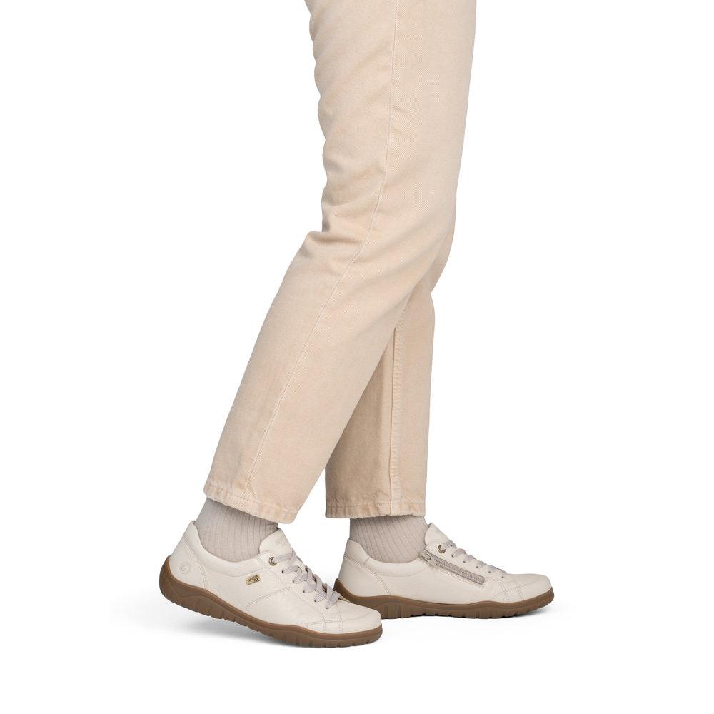Remonte D3T00-60 women's wide beige leather water resistant zip & lace shoes, on-foot lifestyle view.