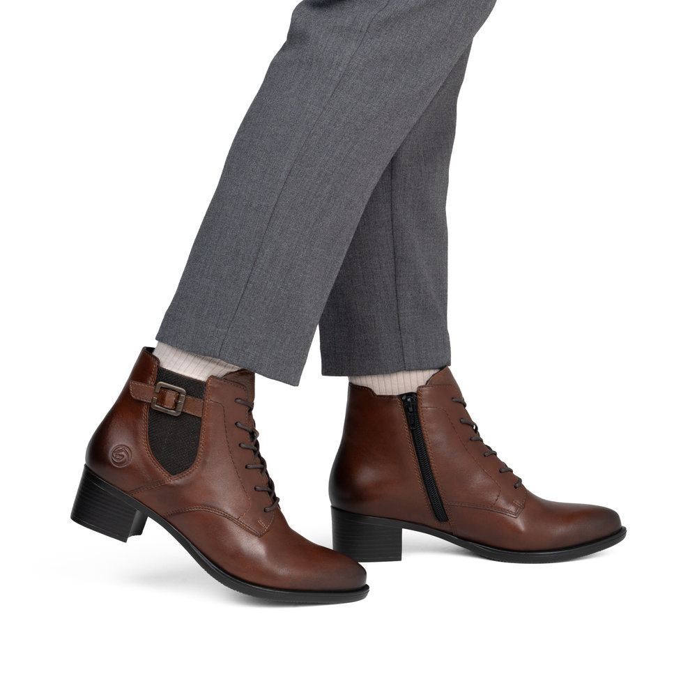 Remonte R5179-23 women's brown leather zip & lace ankle boots, on-foot lifestyle view.