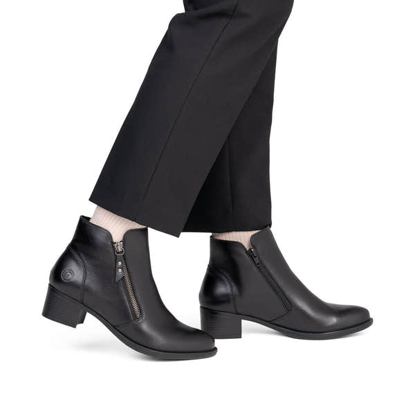 Remonte R5190-00 women's black leather side zip ankle boots, on-foot lifestyle view.