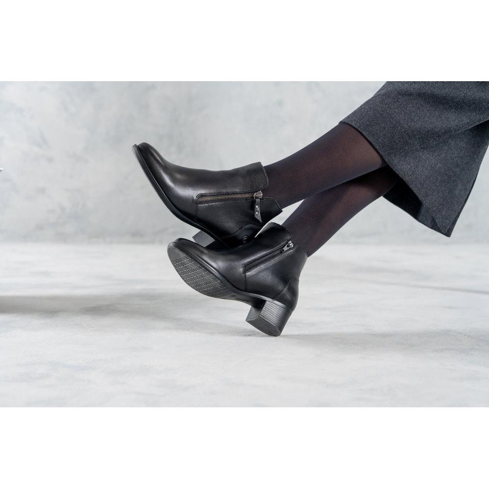 Remonte R5190-00 women's black leather side zip ankle boots, lifestyle view 5 of 8.