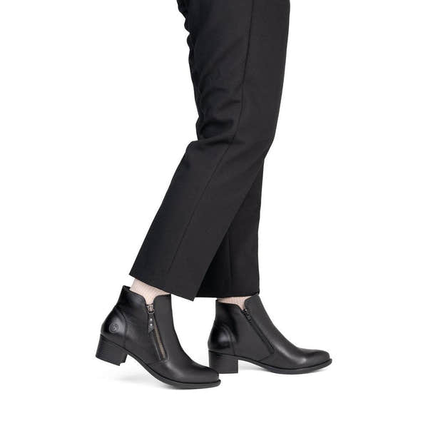 Remonte R5190-00 women's black leather side zip ankle boots, on-foot lifestyle view.
