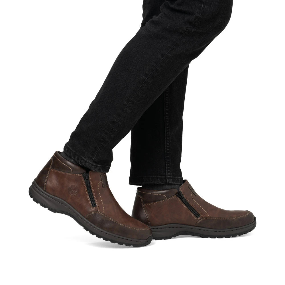 Rieker 03352-24 men's brown leather twin zip ankle boots, on-foot lifestyle view.
