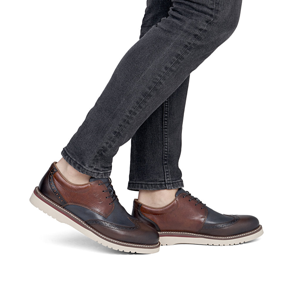 Rieker 04504-25 men's wide brown/navy leather lace up shoes, on-foot lifestyle view.