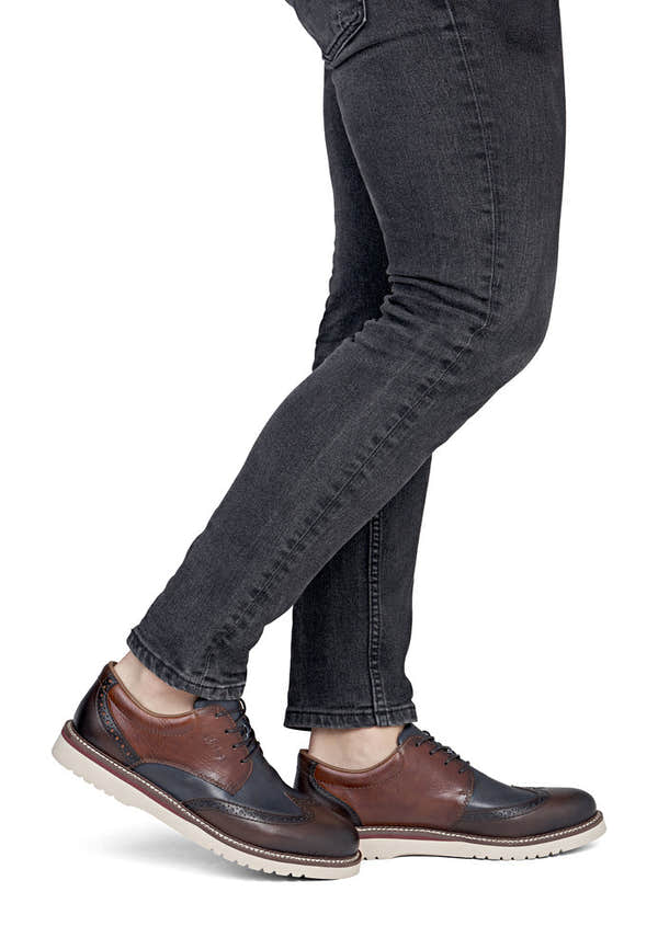 Rieker 04504-25 men's wide brown/navy leather lace up shoes, on-foot lifestyle view.