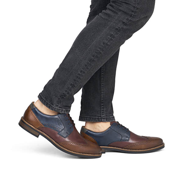 Rieker 13528-90 men's wide brown multi leather lace up shoes, on-foot lifestyle view.