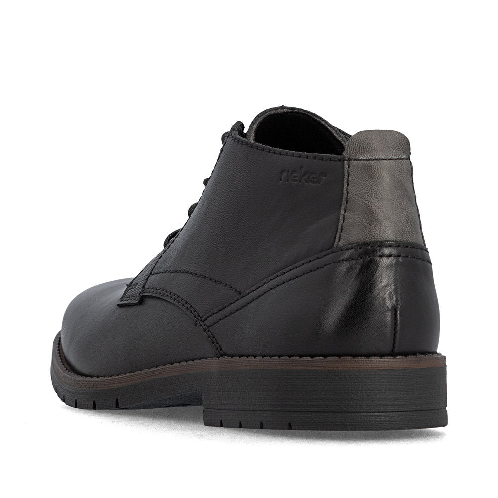 Rieker 13902-00 men's wide black leather zip & lace ankle boots, rear three-quarter view.