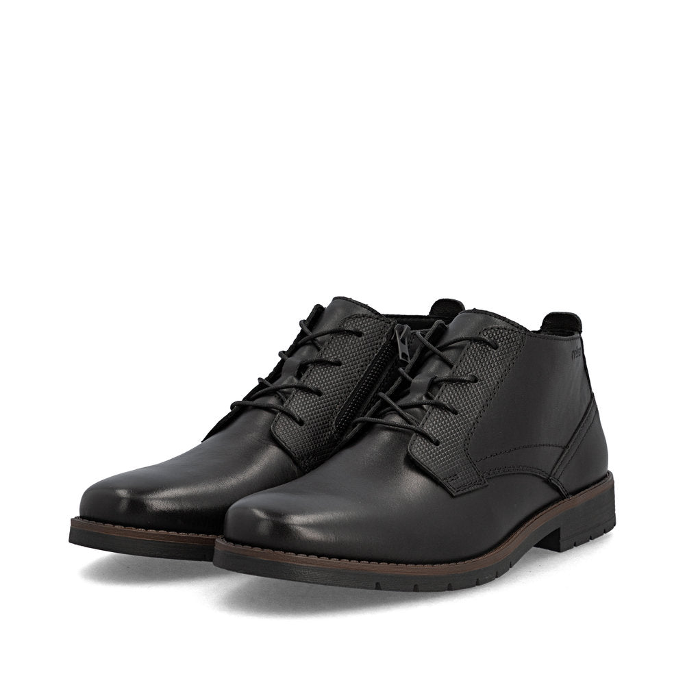 Rieker 13902-00 men's wide black leather zip & lace ankle boots, paired three-quarter view.