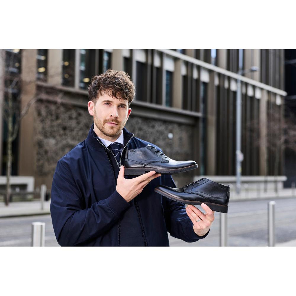 Rieker 13902-00 men's wide black leather zip & lace ankle boots, lifestyle view 1 of 4.
